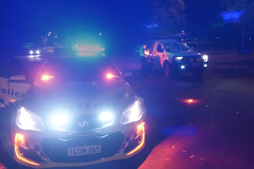 Police checkpoint at night