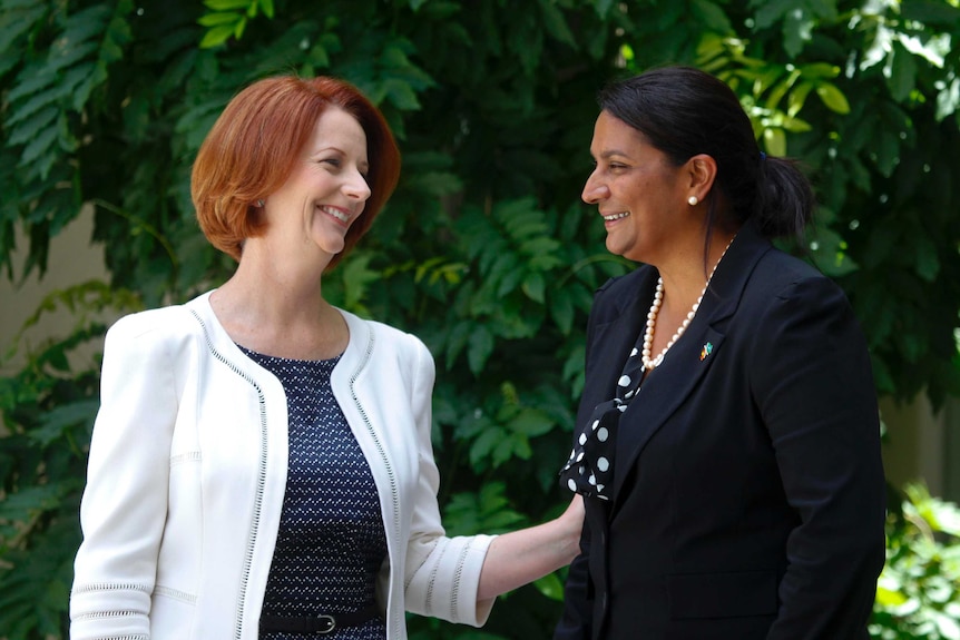 Julia Gillard and Nova Peris pose for photos. (AAP: Lukas Coch)