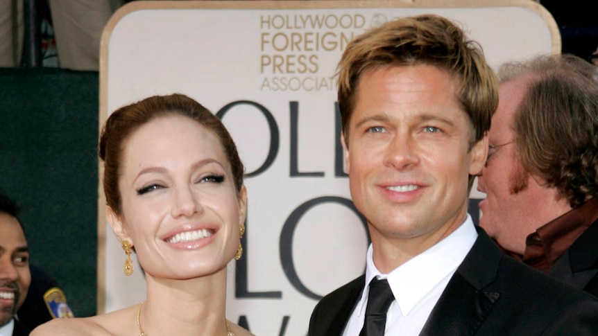 Angelina Jolie and Brad Pitt strike a pose on the red carpet