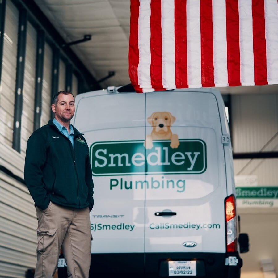Mitch Smedley with one of the work vans