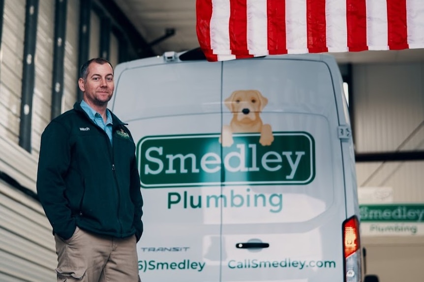 Mitch Smedley with one of the work vans