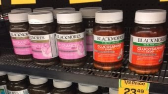 Bottles of Blackmores vitamins on a shelf