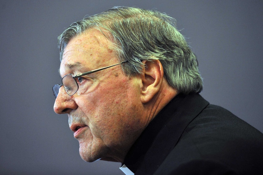 A side profile shot of Cardinal George Pell - his face taking up most of the image.