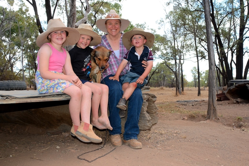 The family farm: Isleigh, 6, Brody, 5, Shontae and Nate, 3, on their cattle property in Pasha, north of Clermont.