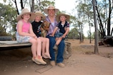 The family farm: Isleigh, 6, Brody, 5, Shontae and Nate, 3, on their cattle property in Pasha, north of Clermont.