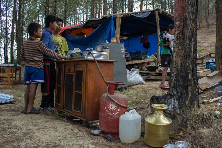 Nepal family sets up home under pine tree