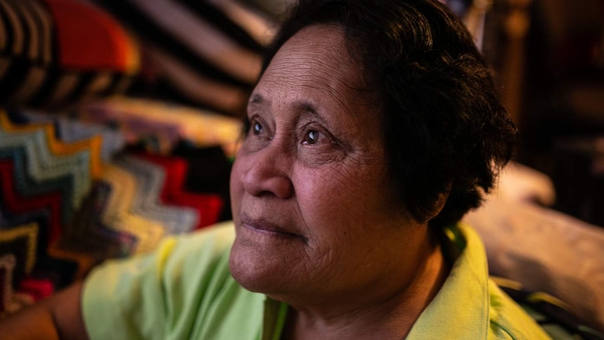 A woman poses for a photo