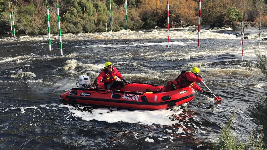 Officers from the Queensland Fire and Emergency Service practicing fast water rescue skills on the Derwent River.