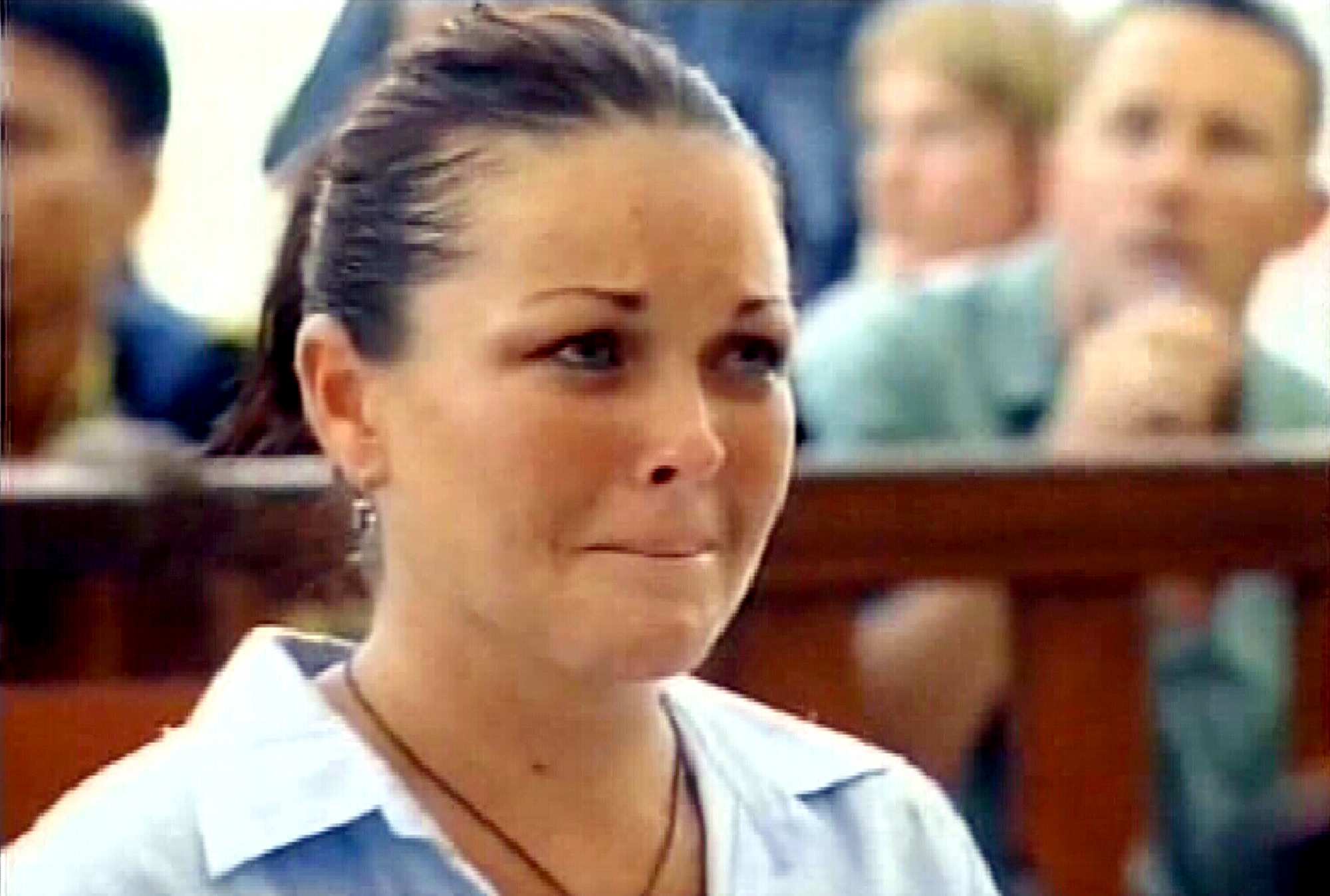 Close up of an emotional Schapelle Corby as she faces court in Denpasar.