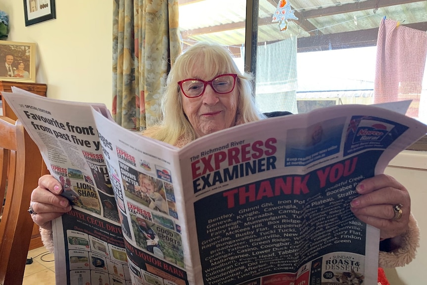 Delma Mustow reads the Richmond River Express-Examiner