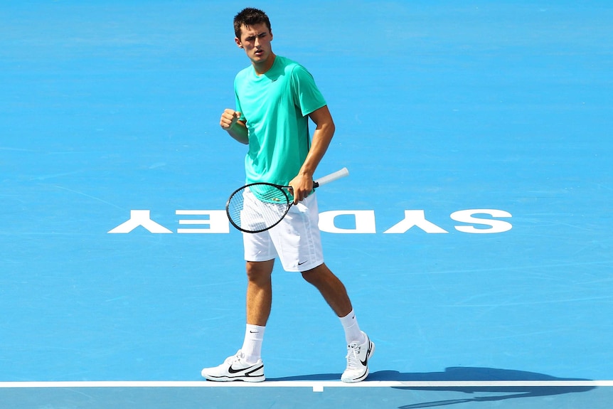 Bernard Tomic powered into the Sydney International quarter-finals with victory over Florian Mayer.