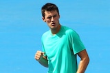 Tomic keeps strong start to summer alive