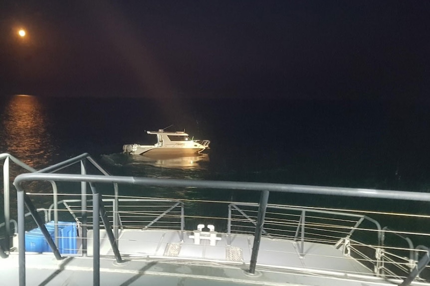 Damaged boat found drifting at night by Yeppoon Water Police with two men dead onboard.