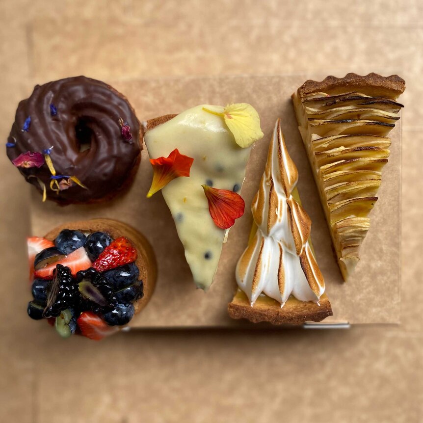 A box of cakes by Audrey Allard of Holy Sugar.