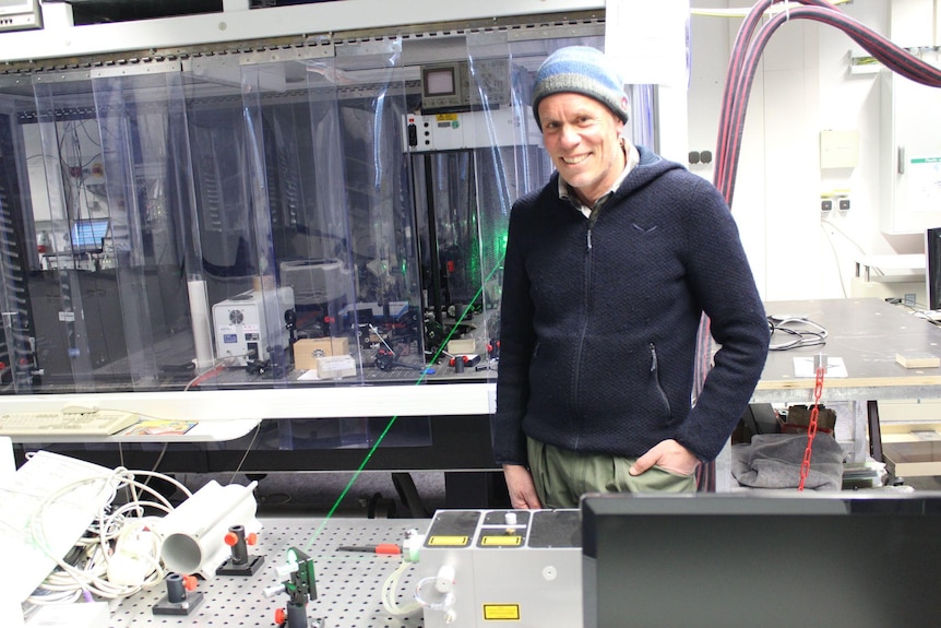 Dr Hannes Vogelmann smiling at camera in his laser lab at Schneefernerhaus