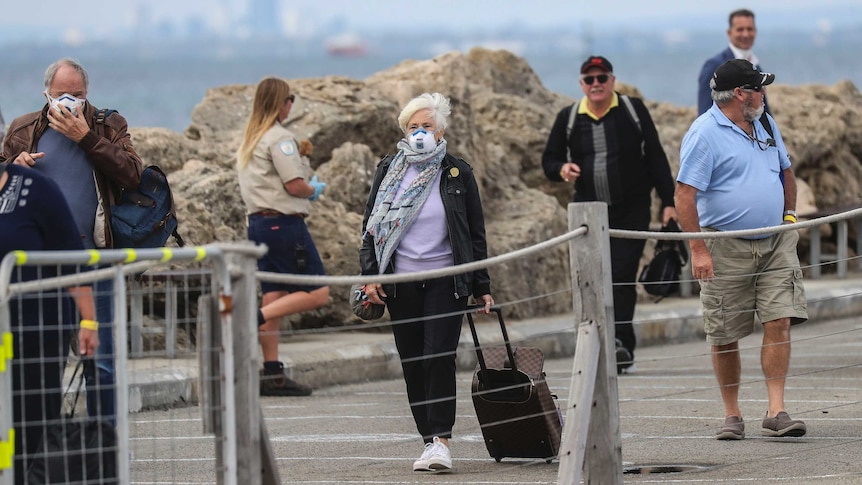 Vasco Da Gama passengers, some wearing masks, at Rottnest jetty