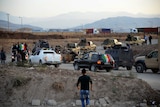 A convoy of Peshmerga vehicles arrives in southeastern Turkey