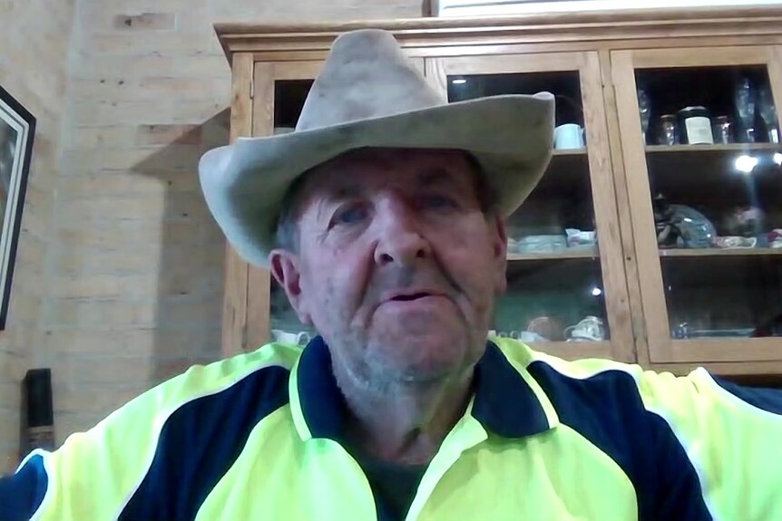 Emerald farmer Maurie Iddles wears a high-vis shirt and cowboy hat