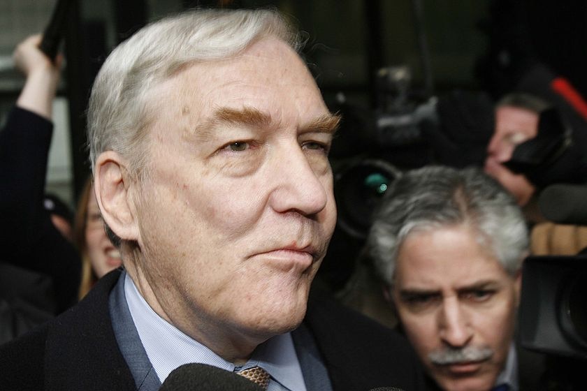 A close-up of Conrad Black as he walks out of court.