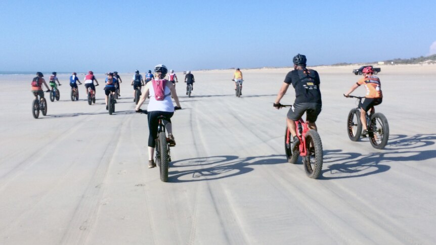 Kimberley Fat Bike Club riders take to Cable Beach.