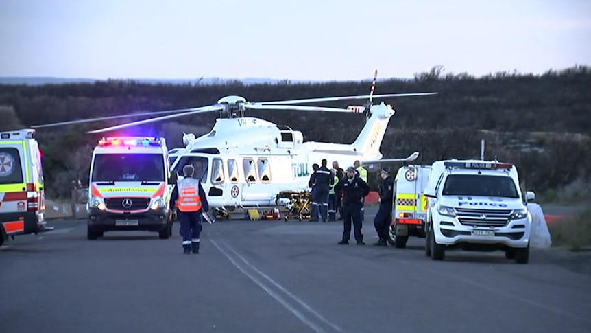 Ambulances and a helicopter