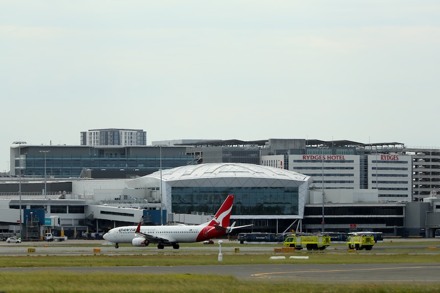 A Qantas plane on a runway