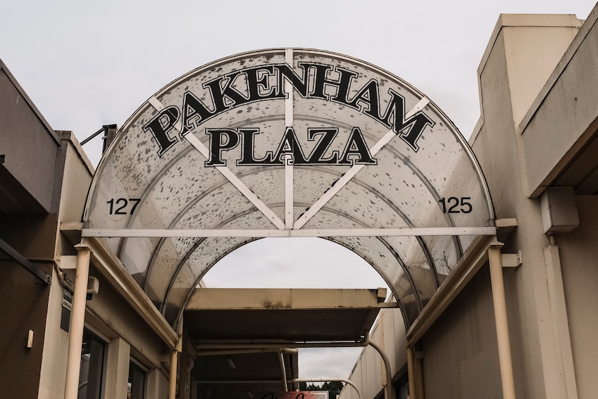 There is a large, arched sign that says "Pakenham Plaza," in bold upper case.