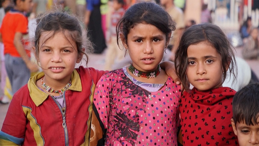 Three young girls in Iraq.