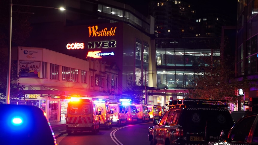 westfield bondi sign with ambulances in front of building