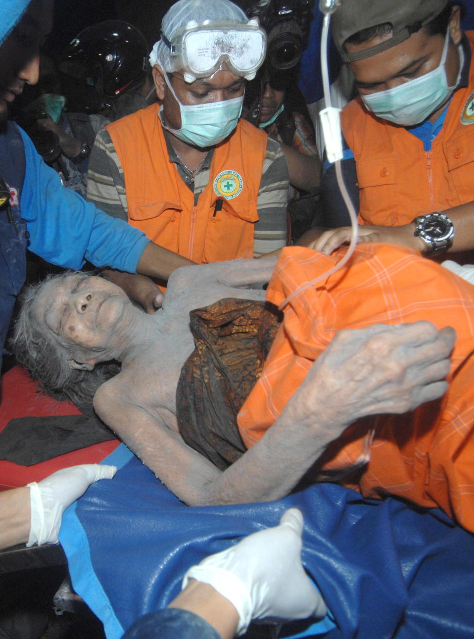 Indonesian volcano erupts, killing dozens - ABC News