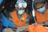 An ash covered victim of Indonesia's Mount Merapi volcano eruption arrives at a Yogyakarta hospital