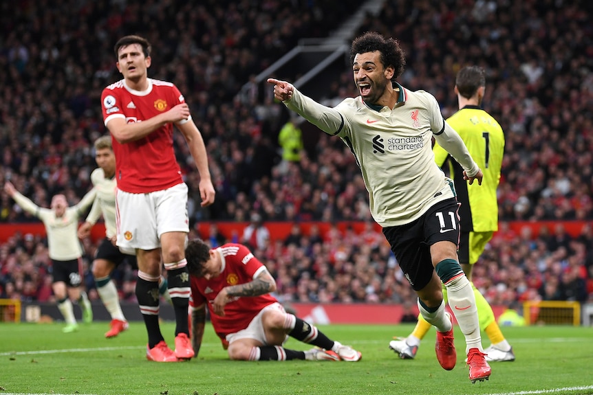 Mohamed Salah celebrates scoring against Manchester United