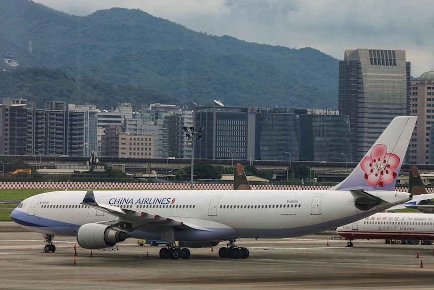A passenger jet of Taiwan's China Airlines at Taipei Songshan Airport in Taipei, Taiwan.