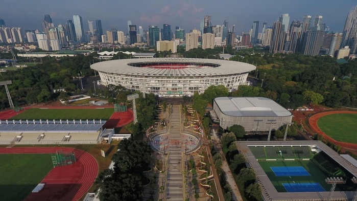 High angle photo of sports stadium and sports complex surrounded by buildings in the centre of Jakarta.