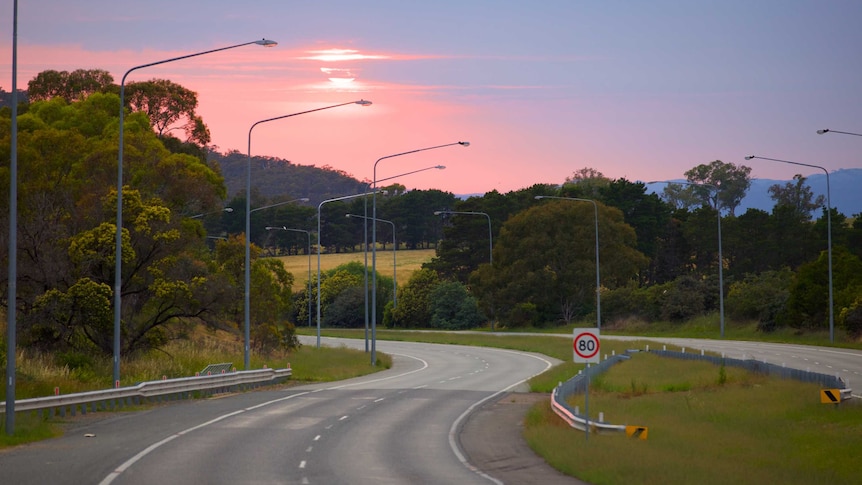 The sun struggles to break through on William Hovell Drive