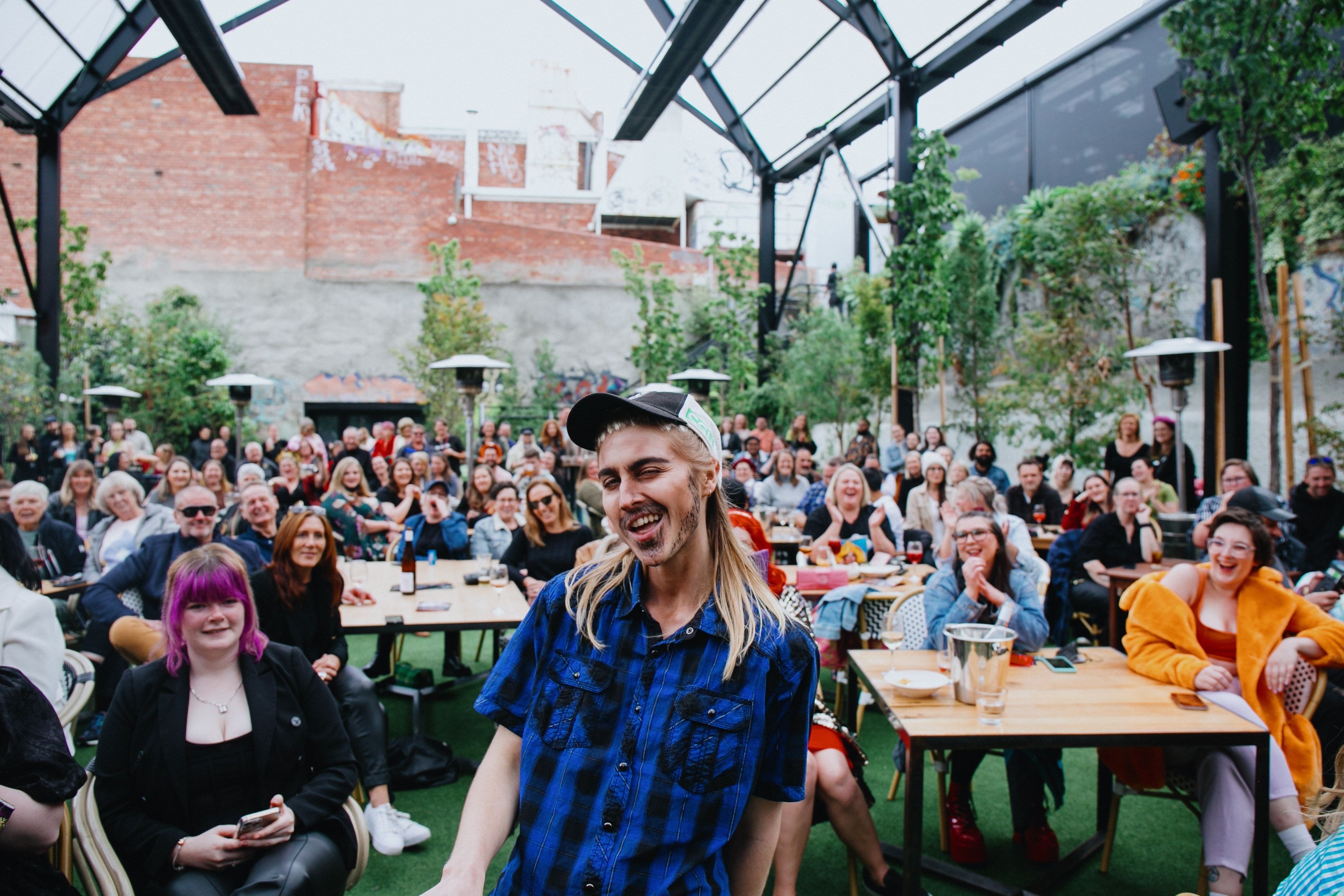 Meet the mullet-bearing drag kings of Hobart lip-syncing about Centrelink