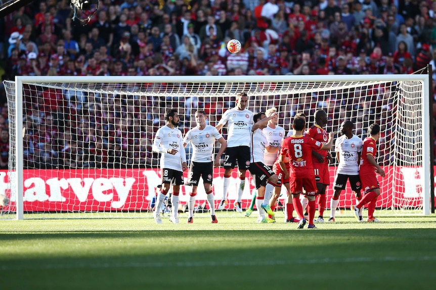 Adelaide United's Isaias scores from a free kick against Western Sydney in A-League Grand Final.