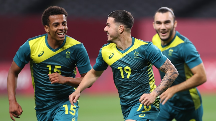 Olyroos continue Australian football’s winning start to Tokyo Olympics by shocking Argentina