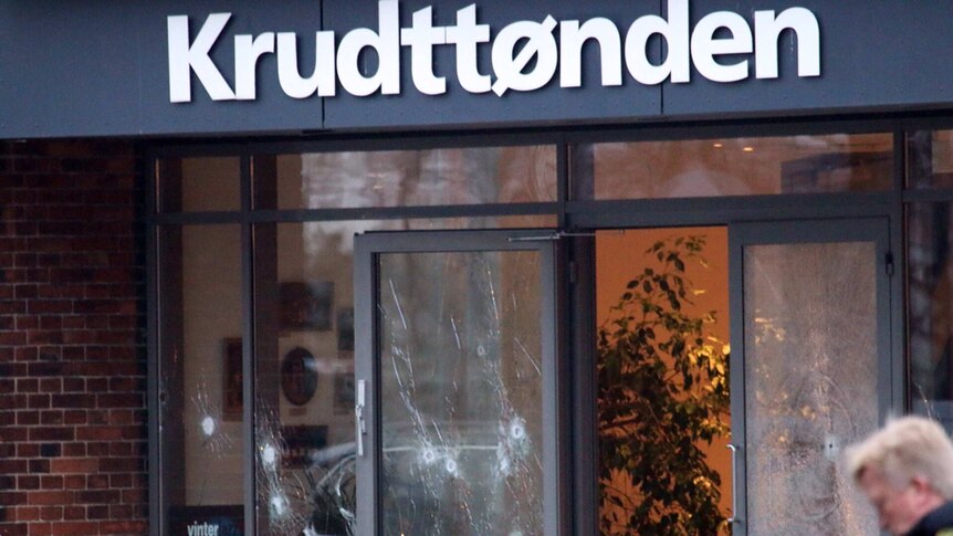 Gunshots through Danish cafe