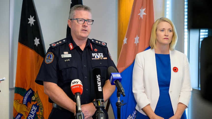 NT Police Commissioner Jamie Chalker and Police Minister Nicole Manison standing next to each other at a press conference