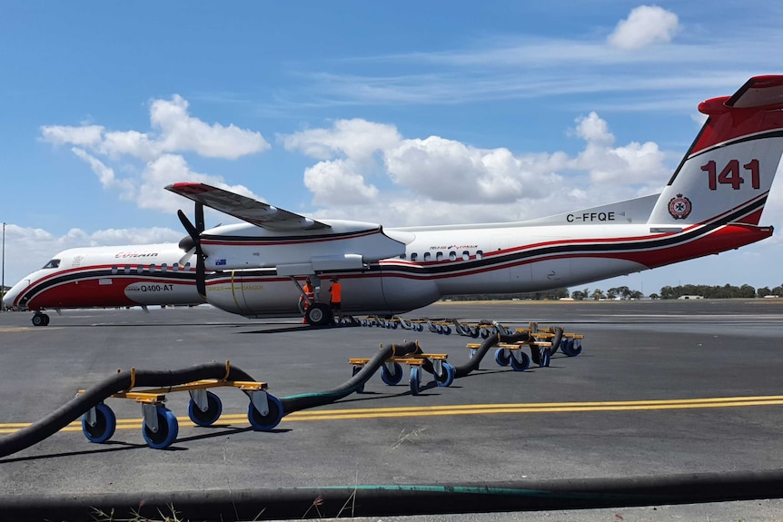 A large plane on a tarmac.