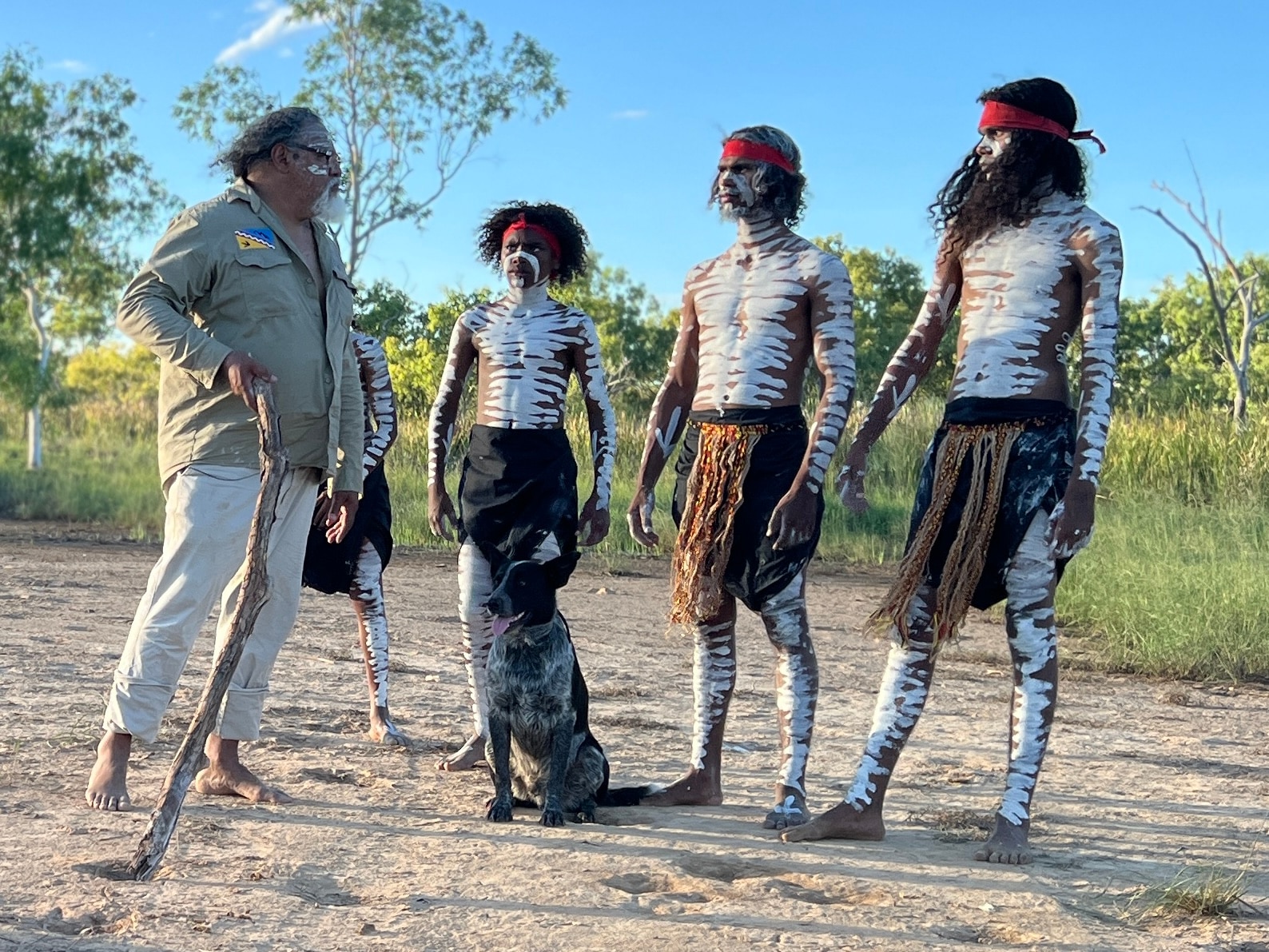 Members of the Wangan and Jaganlingou group, some wearing traditional body paint