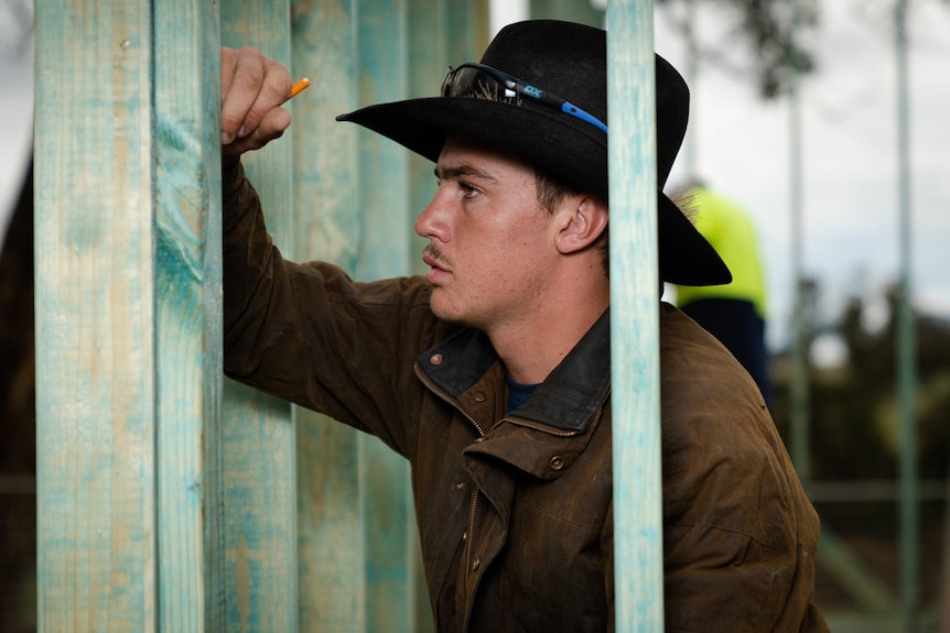 BackTrack trainee Mark measuring wood.