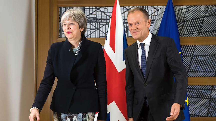 British Prime Minister Theresa May, left, stands next to European Council President Donald Tusk