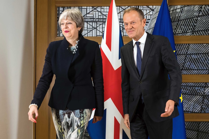 British Prime Minister Theresa May, left, stands next to European Council President Donald Tusk