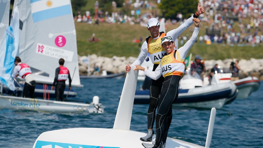 Mathew Belcher and Malcolm Page celebrate after winning 470 gold