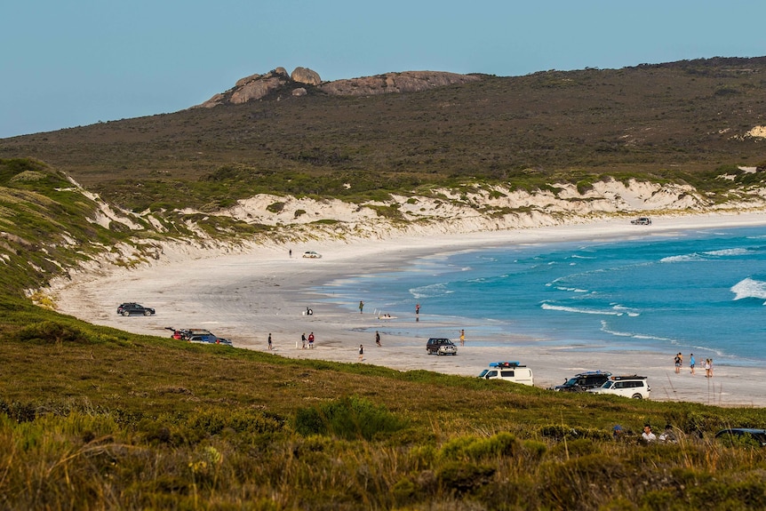 Tourists fish and drive at Lucky Bay