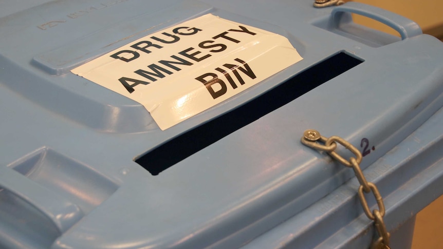 A close up photo of a drug amnesty bin.