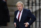 Former mayor of London Boris Johnson walks to 10 Downing Street in central London.