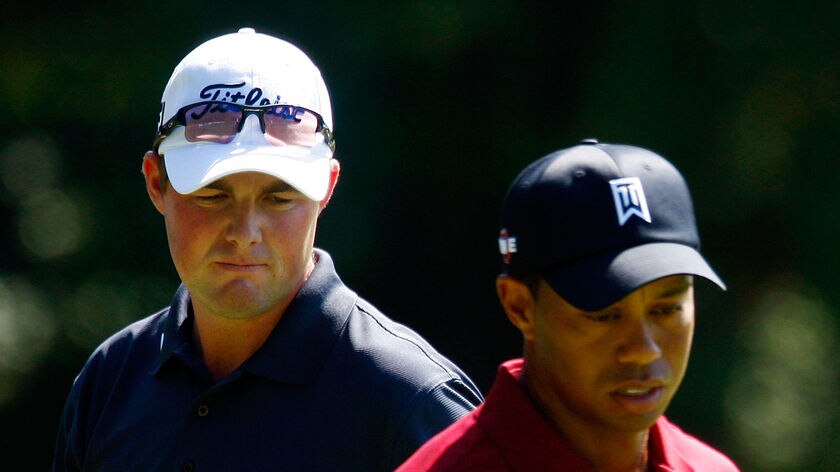 Revered company ... Marc Leishman (l) with Tiger Woods during the final round at Cog Hill